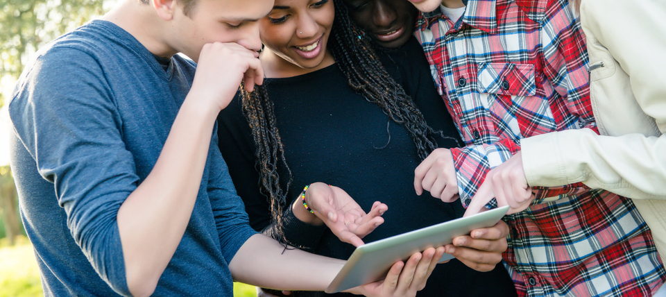 teenagers using ipad