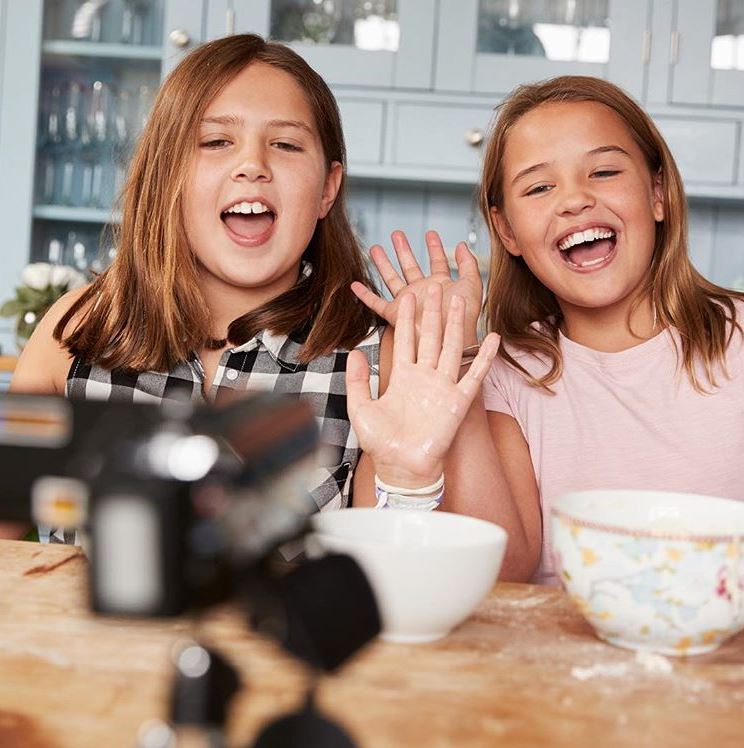 two girls laughing