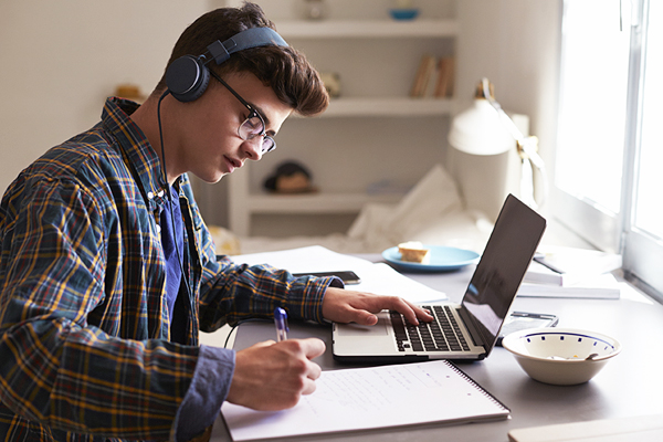 teenage on laptop
