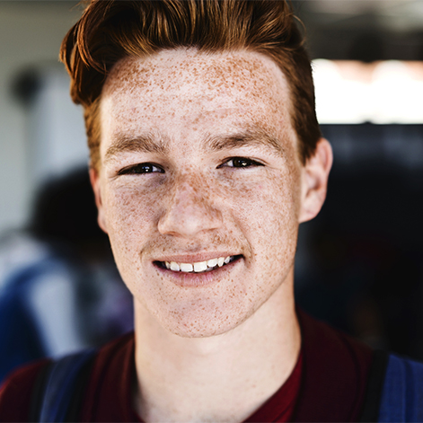 teenage boy smiling