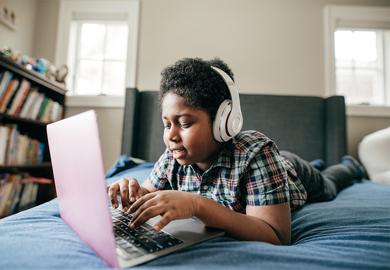young boy on laptop
