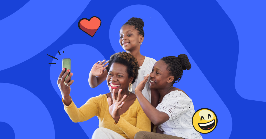 mother and two daughters taking a selfie, with heart and smiley faces emojis around them