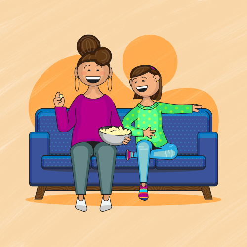 A parent and child sitting on a couch eating popcorn together