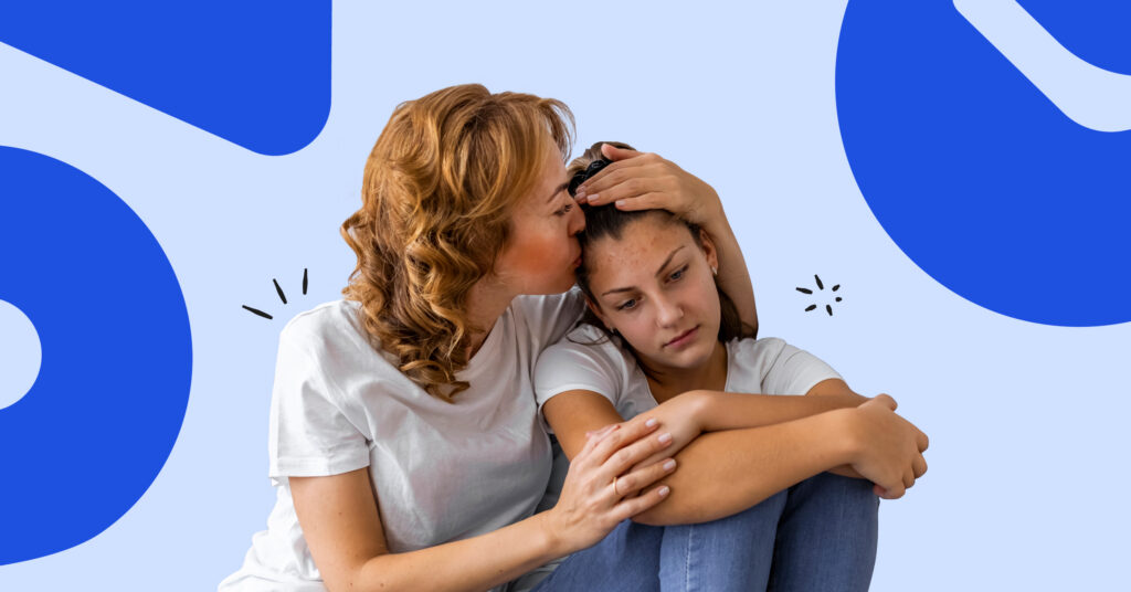 Teen mental health — mom and daughter hugging