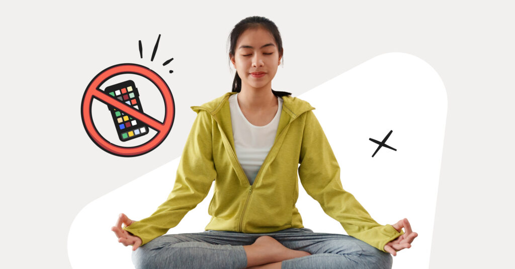 girl doing yoga, smart phone in cancel symbol