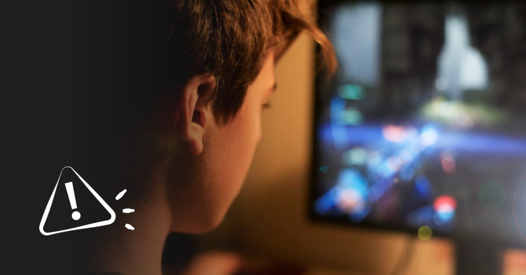 Negative effects of video games header image - boy playing a video game