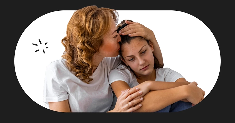 mother consoling her daughter