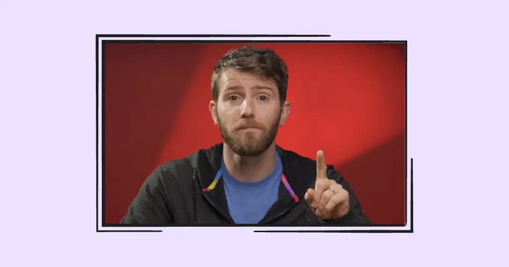 screen grab of linus in a box, purple background