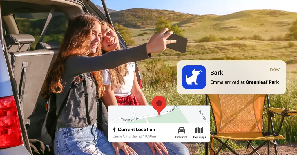 two teen girls camping, taking selfie, snippet of bark location alert