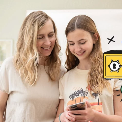 mom and daughter looking at smartphone