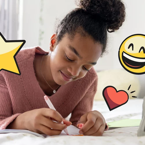 child smiling with illustrated emojis around her