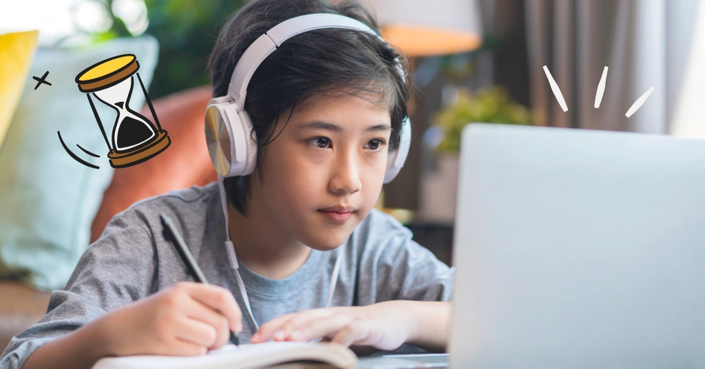 kid doing homework on a laptop