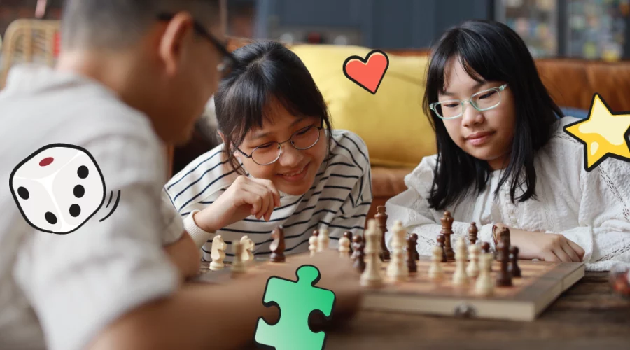 kids playing chess with parents