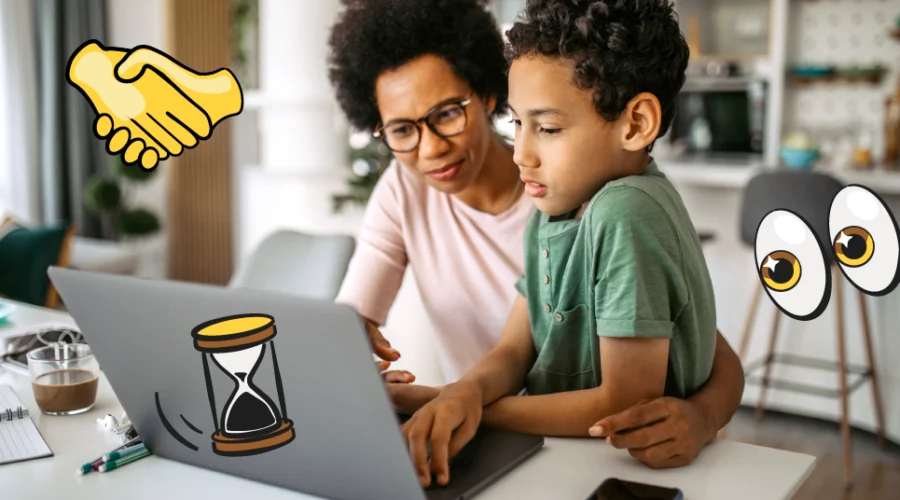 mom and son sitting at a laptop