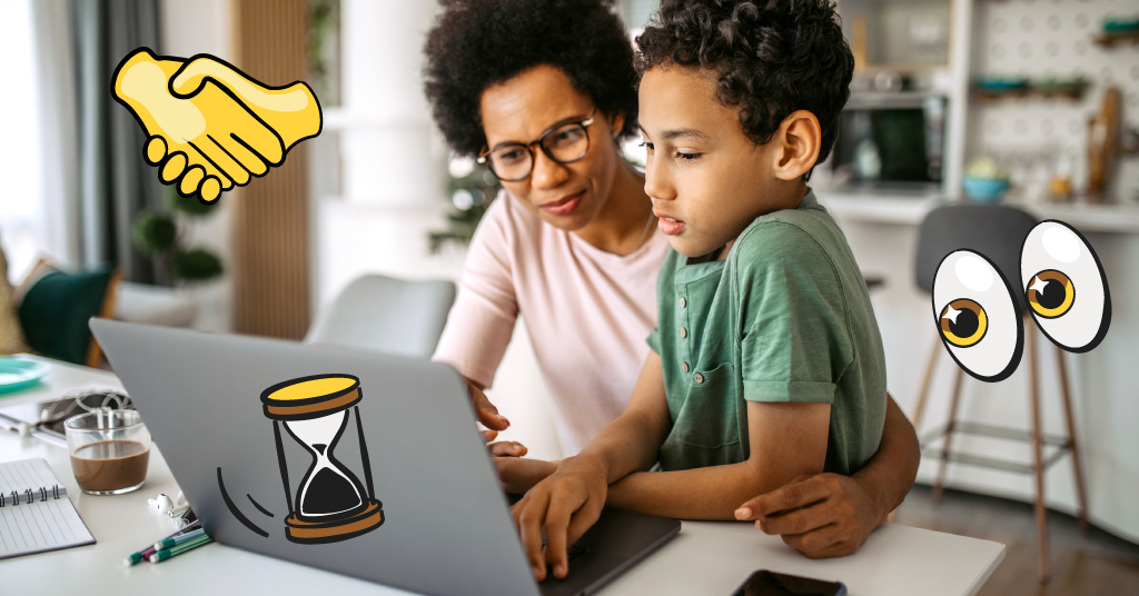 mom and son sitting at a laptop