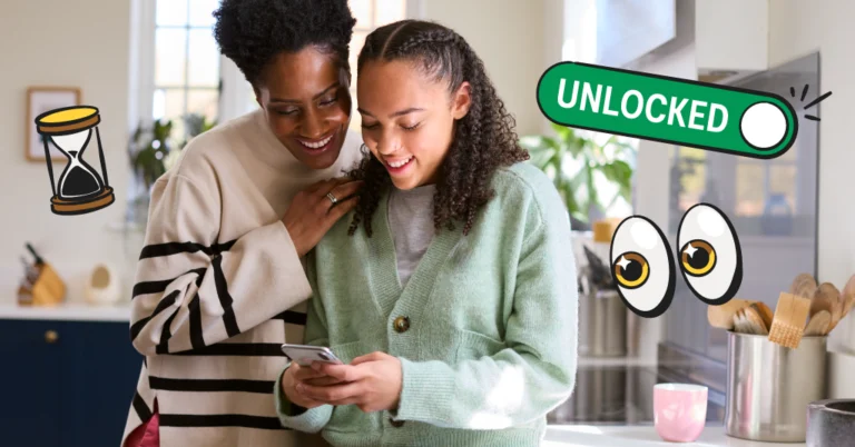 mother and daughter looking at phone