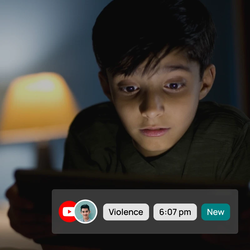 boy looking at an ipad, bark alert