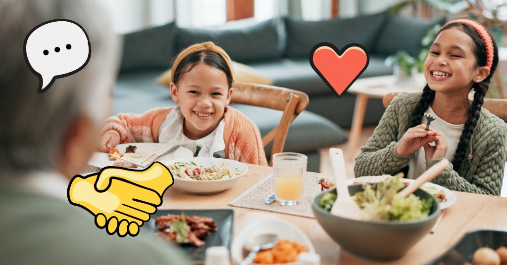kids sitting at a family table during a meal