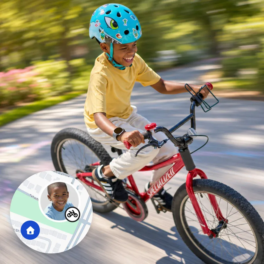 A kid riding a bike, with location tracking from the Bark Watch