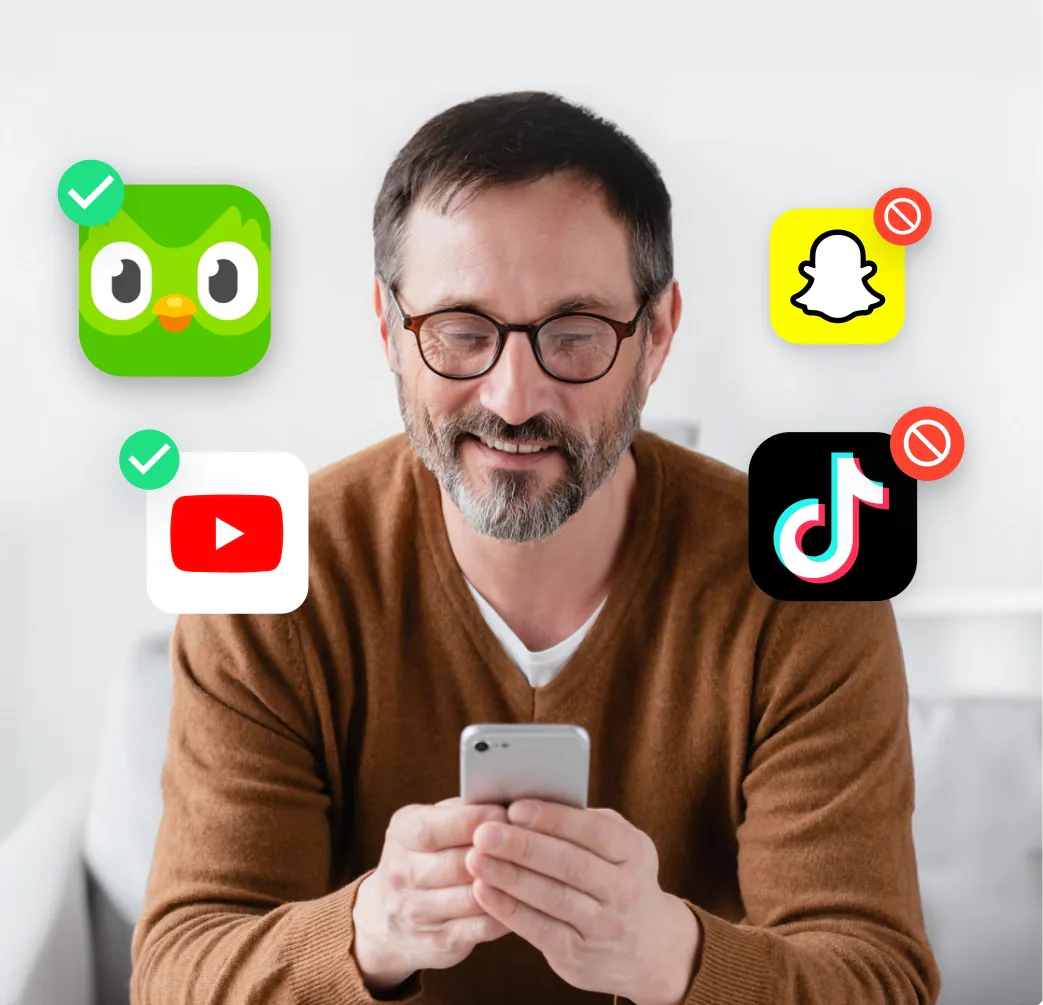 Dad looking at his phone with app icons Bark can block
